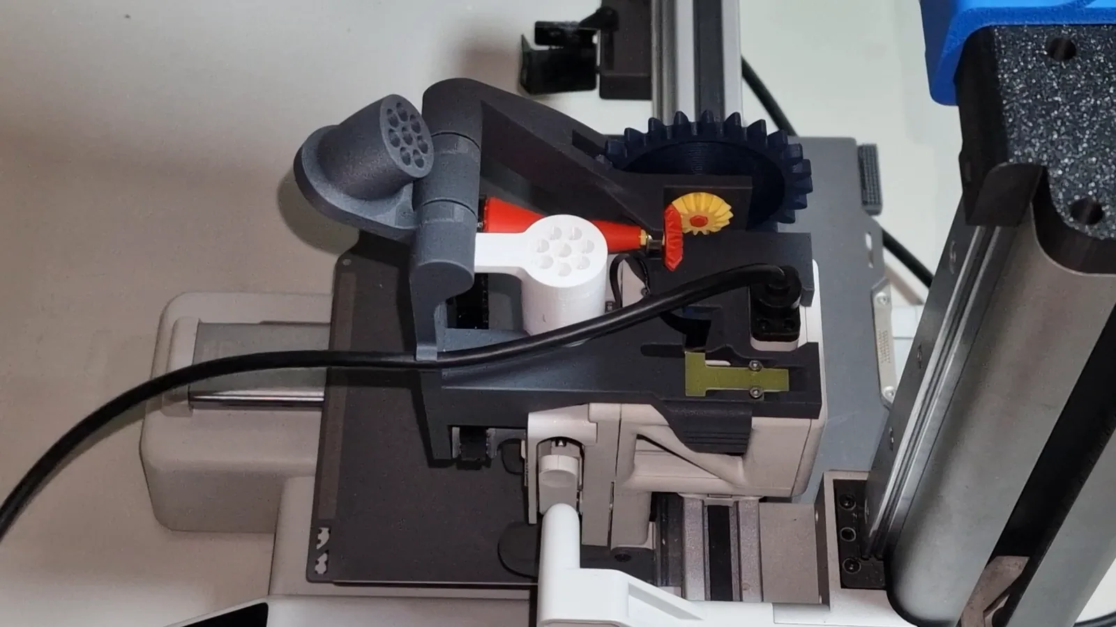 The Mechams toolhead module mounted on a Bambu Lab A1 mini, seen from above, before the PTFE tubes go in