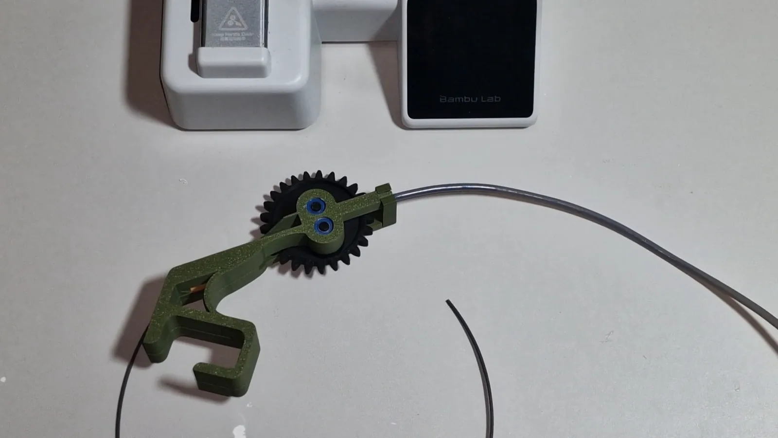 An assembled Mechams docking station with filament loaded and its PTFE tube fitted