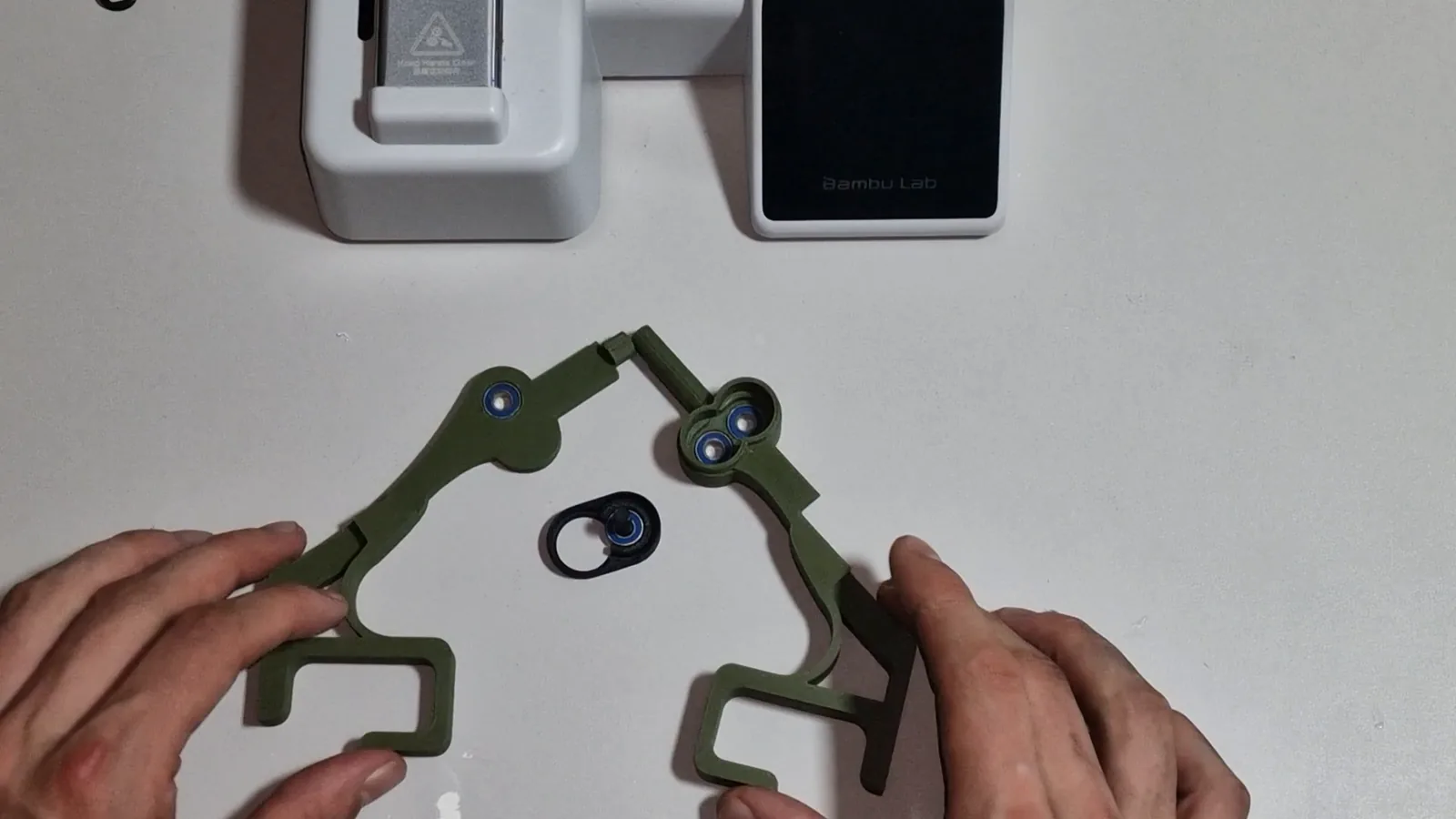 Docking station body halves and the small bracket with four bearings fitted